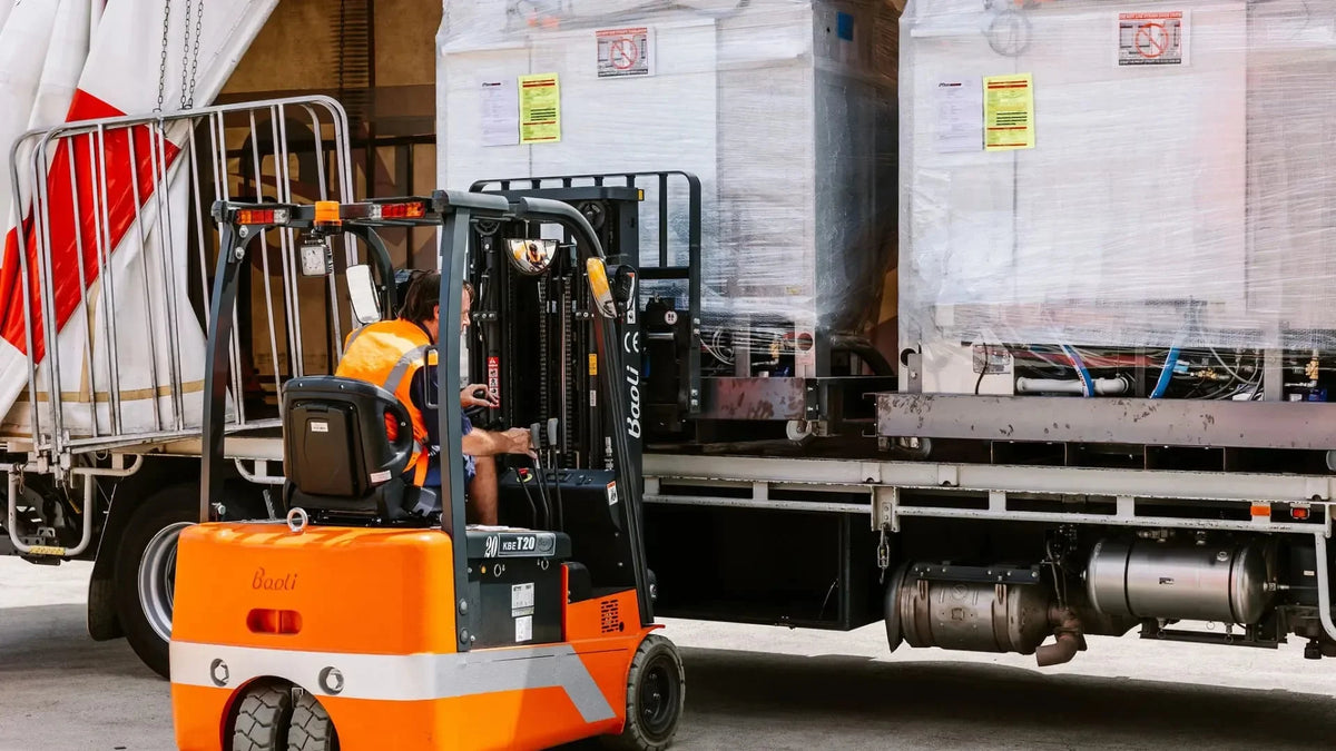 Commercial ovens being unloaded for regional delivery